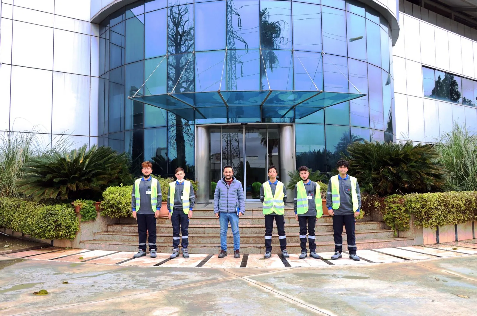 Visitors outside the AKE building